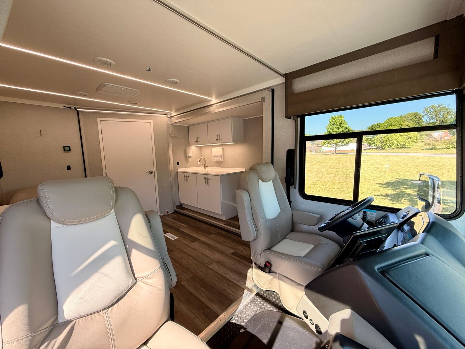 Cab and companion seating with the galley and sink beyond